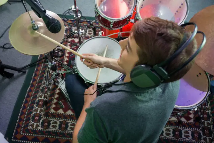 Why Do Drummers Wear Headphones When They Play