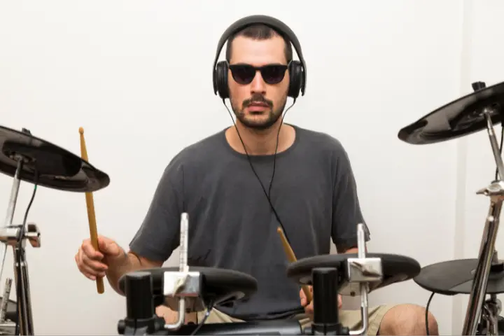 Why Do Drummers Wear Headphones When They Play